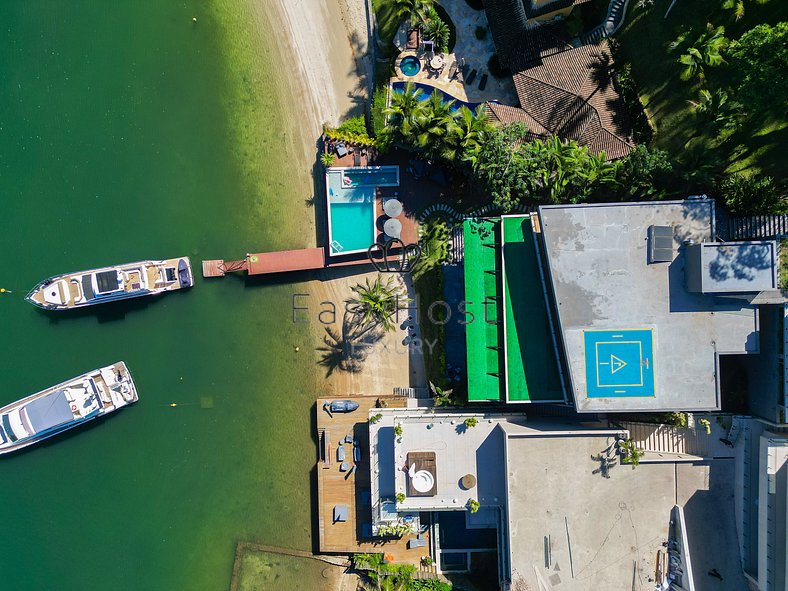 Aluguel de casa luxuosa com piscina beira mar, praia e acade